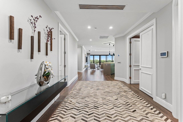 7383 Orangewood Ln Unit 304, Boca Raton, FL 33433 - hallway with dark wood finished floors, ornamental molding, recessed lighting, and baseboards