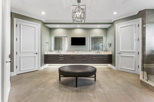 7383 Orangewood Ln Unit 304, Boca Raton, FL 33433 - bathroom with ornamental molding, baseboards, a shower stall, double vanity, and recessed lighting