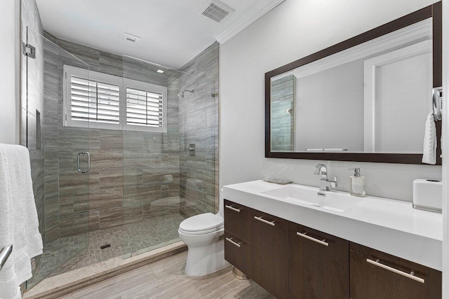 7383 Orangewood Ln Unit 304, Boca Raton, FL 33433 - bathroom featuring toilet, a stall shower, vanity, and ornamental molding