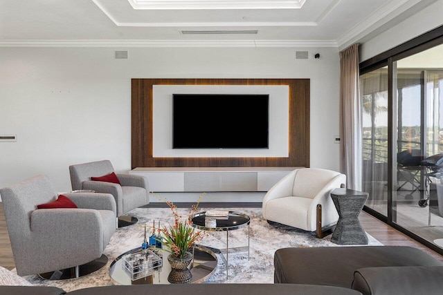 7383 Orangewood Ln Unit 304, Boca Raton, FL 33433 - living area featuring a raised ceiling, wood finished floors, and ornamental molding