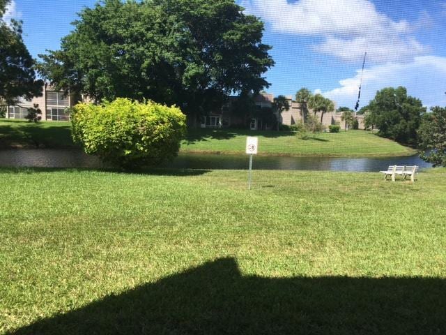 829 Camino Rd Unit 112-B, Delray Beach, FL 33445 - view of grassy yard with a water view
