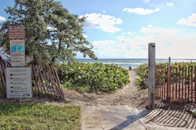 829 Camino Rd Unit 112-B, Delray Beach, FL 33445 - water view with fence and nearby beach