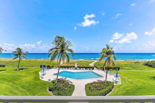 1225 S Ocean Blvd Unit 302, Delray Beach, FL 33483 - community pool featuring a water view, a yard, and a patio area