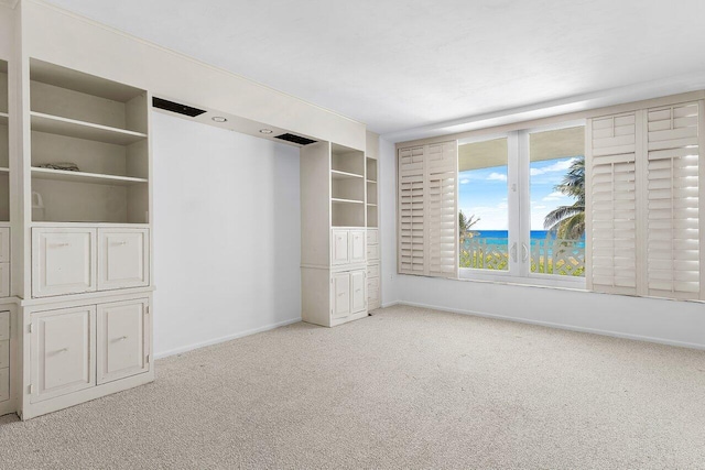 1225 S Ocean Blvd Unit 302, Delray Beach, FL 33483 - unfurnished bedroom featuring carpet floors and baseboards