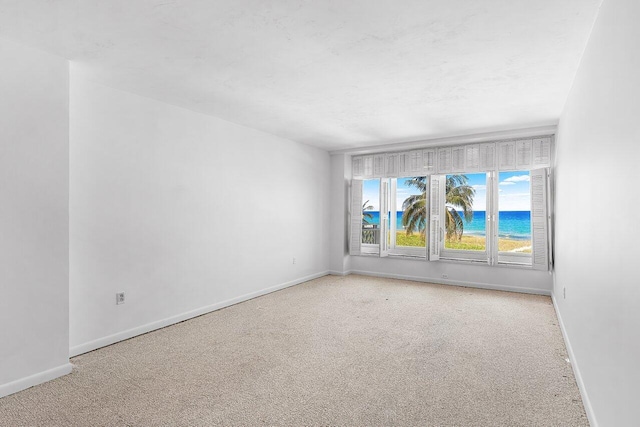 1225 S Ocean Blvd Unit 302, Delray Beach, FL 33483 - spare room with light colored carpet