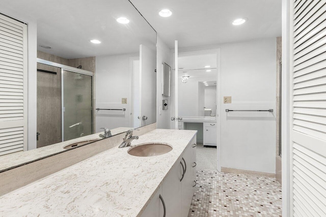 1225 S Ocean Blvd Unit 302, Delray Beach, FL 33483 - full bathroom featuring a shower stall, vanity, recessed lighting, tile patterned flooring, and a closet