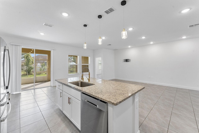 2132 SW Vista Rd, Port Saint Lucie, FL 34953 - kitchen featuring visible vents, stainless steel appliances, white cabinets, and a sink