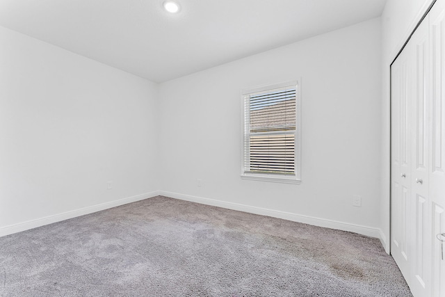 2132 SW Vista Rd, Port Saint Lucie, FL 34953 - unfurnished bedroom featuring recessed lighting, a closet, carpet floors, and baseboards