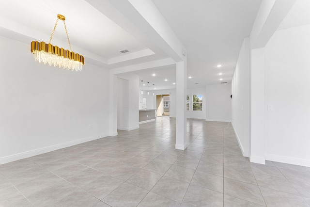 2132 SW Vista Rd, Port Saint Lucie, FL 34953 - unfurnished living room featuring recessed lighting, light tile patterned flooring, a notable chandelier, visible vents, and baseboards