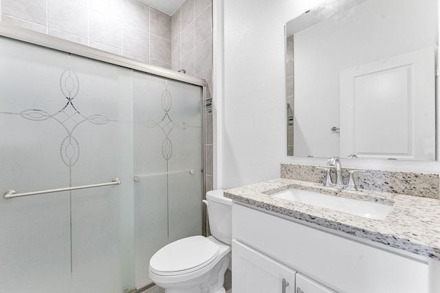 2132 SW Vista Rd, Port Saint Lucie, FL 34953 - full bathroom featuring toilet, vanity, and a shower stall