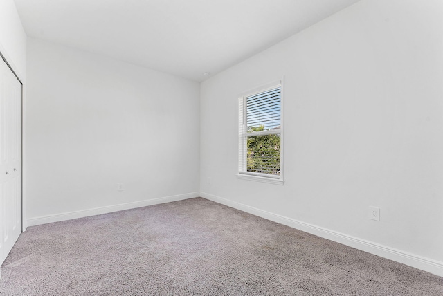 2132 SW Vista Rd, Port Saint Lucie, FL 34953 - carpeted spare room featuring baseboards