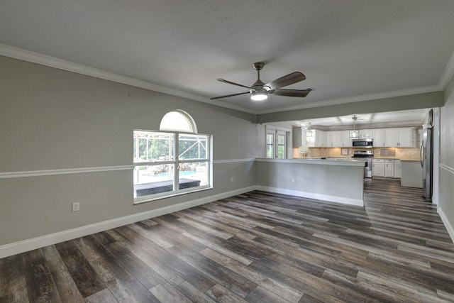 unfurnished living room featuring baseboards, ornamental molding, ceiling fan, and dark wood-style flooring