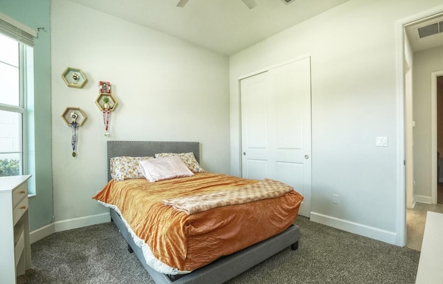 15581 Goldfinch Cir, The Acreage, FL 33470 - bedroom featuring carpet floors, multiple windows, and baseboards