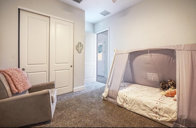15581 Goldfinch Cir, The Acreage, FL 33470 - bedroom featuring carpet flooring, a closet, baseboards, and ceiling fan