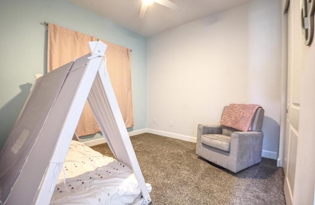 15581 Goldfinch Cir, The Acreage, FL 33470 - bedroom with dark colored carpet, baseboards, and ceiling fan