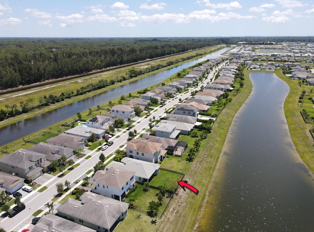 15581 Goldfinch Cir, The Acreage, FL 33470 - aerial perspective of suburban area featuring a large body of water