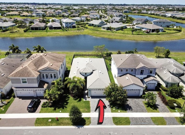 15581 Goldfinch Cir, The Acreage, FL 33470 - aerial view of residential area featuring a large body of water