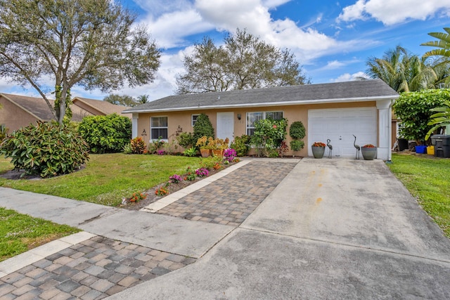 single story home with a garage, stucco siding, a front yard, and driveway