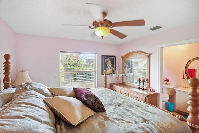 bedroom featuring visible vents, ceiling fan, and multiple windows
