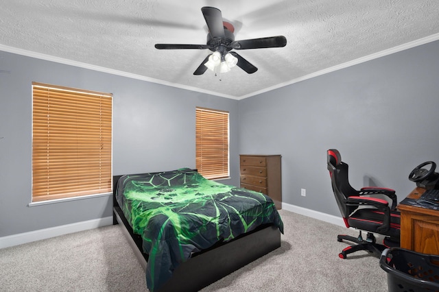 bedroom featuring baseboards, carpet floors, a textured ceiling, and crown molding