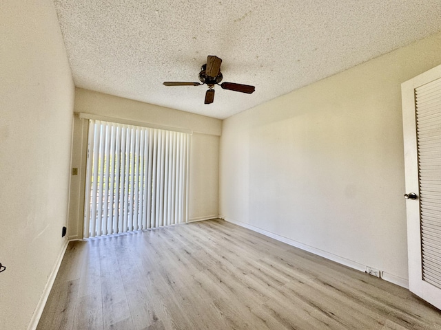 82 Dorset Unit B, Boca Raton, FL 33434 - unfurnished room featuring wood finished floors, ceiling fan, and a textured ceiling