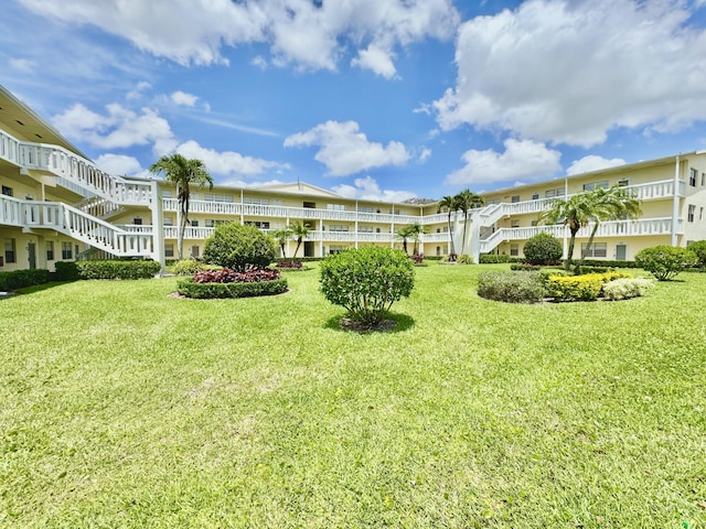 82 Dorset Unit B, Boca Raton, FL 33434 - surrounding community featuring a yard