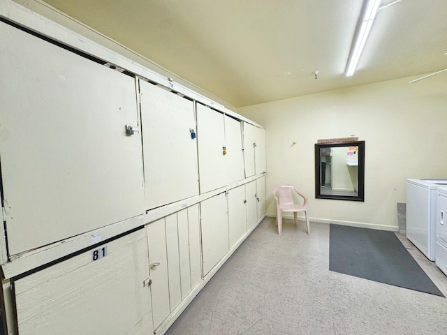 82 Dorset Unit B, Boca Raton, FL 33434 - hallway with washer and dryer and baseboards