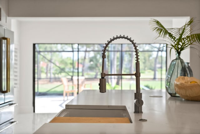 interior details featuring refrigerator