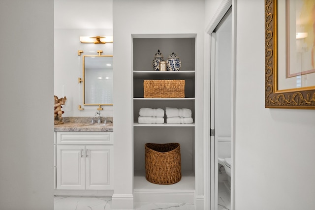 pantry with a sink