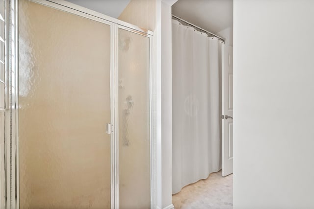 full bathroom featuring a stall shower