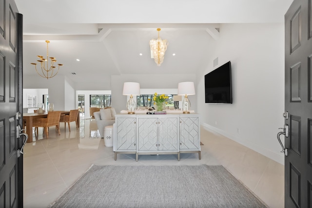 living room featuring light tile patterned flooring, lofted ceiling, and a chandelier
