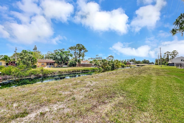 view of yard with a water view