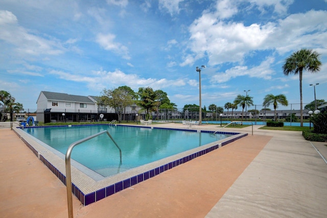 pool featuring fence