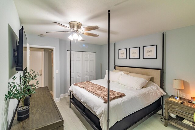 bedroom featuring a ceiling fan and a closet