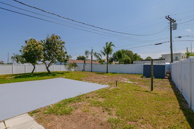 712 NE Camino St, Port Saint Lucie, FL 34952 - view of yard with a patio and a fenced backyard
