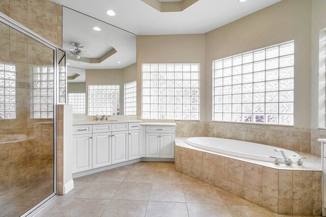 6616 Cobia Cir, Boynton Beach, FL 33437 - full bath with ceiling fan, a bath, a stall shower, vanity, and recessed lighting
