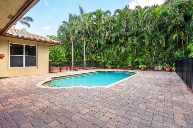 6616 Cobia Cir, Boynton Beach, FL 33437 - view of swimming pool with a patio area