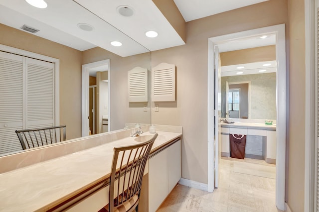 7460 La Paz Blvd Unit 206, Boca Raton, FL 33433 - bathroom with recessed lighting, marble finish floor, vanity, baseboards, and visible vents