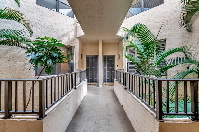 7460 La Paz Blvd Unit 206, Boca Raton, FL 33433 - entrance to property featuring stucco siding and a balcony