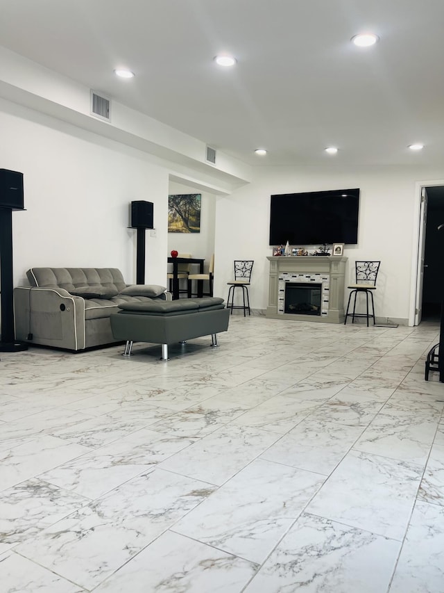 4730 W 8th Pl, Hialeah, FL 33012 - living area featuring recessed lighting, visible vents, and marble finish floor