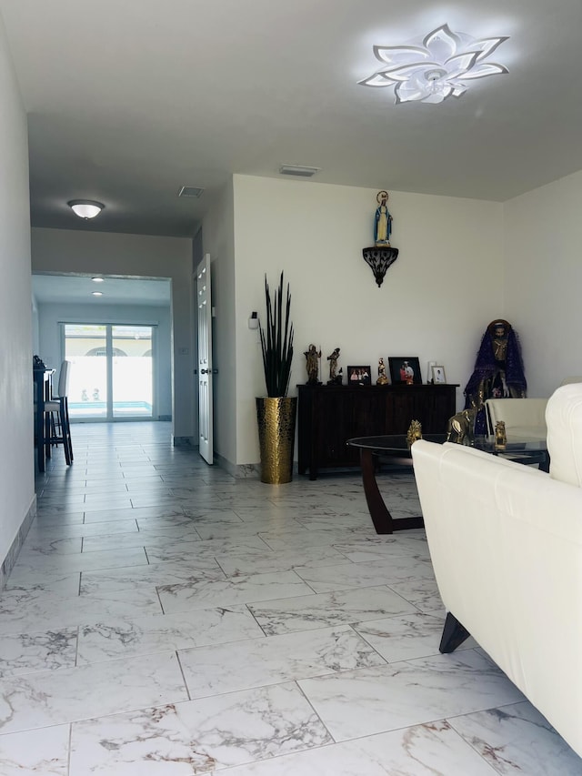 4730 W 8th Pl, Hialeah, FL 33012 - corridor featuring marble finish floor and visible vents