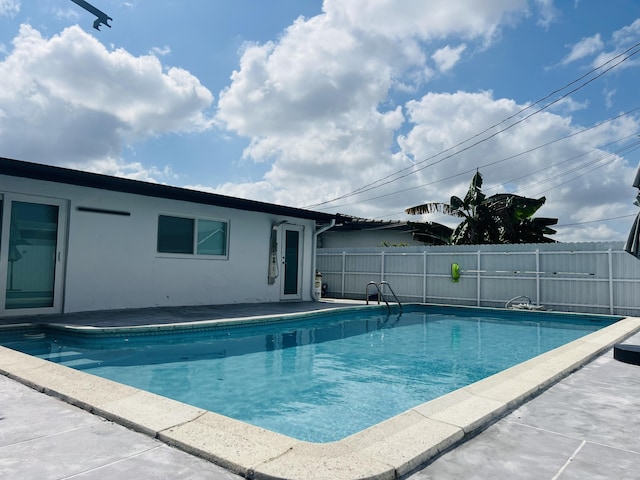 4730 W 8th Pl, Hialeah, FL 33012 - view of swimming pool featuring a fenced in pool and fence