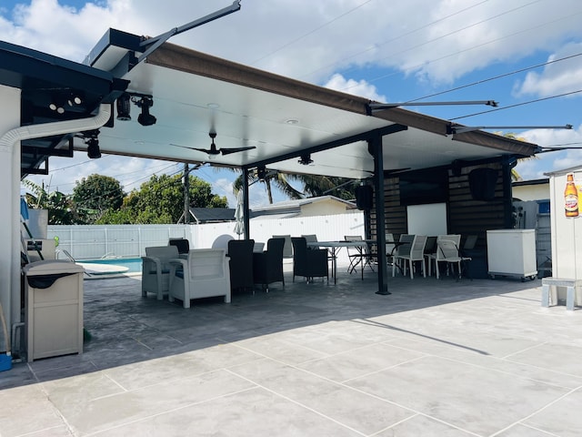 4730 W 8th Pl, Hialeah, FL 33012 - view of patio with a fenced backyard and outdoor dining space