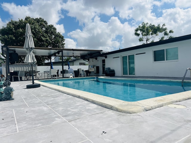 4730 W 8th Pl, Hialeah, FL 33012 - view of pool with fence, a fenced in pool, and a patio area