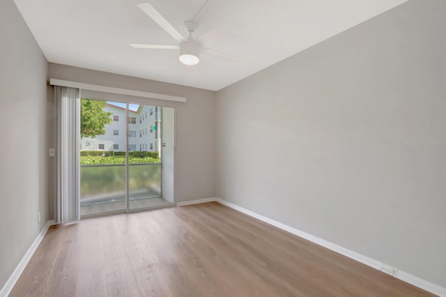 296 Fanshaw H, Boca Raton, FL 33434 - spare room with wood finished floors, baseboards, and ceiling fan