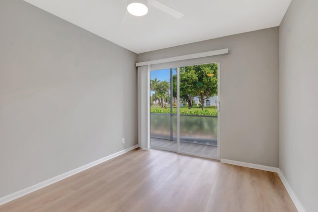 296 Fanshaw H, Boca Raton, FL 33434 - unfurnished room featuring wood finished floors, ceiling fan, and baseboards