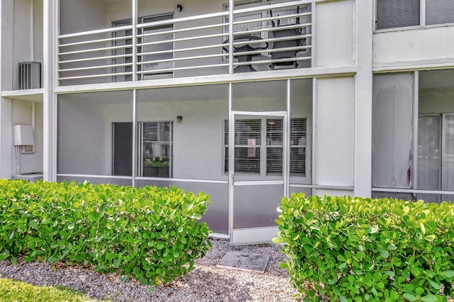 296 Fanshaw H, Boca Raton, FL 33434 - property entrance with a balcony