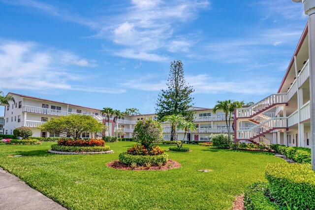 296 Fanshaw H, Boca Raton, FL 33434 - view of home's community with a yard and a residential view
