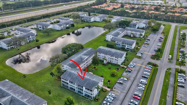 296 Fanshaw H, Boca Raton, FL 33434 - drone / aerial view of a nearby body of water and apartment complex / building