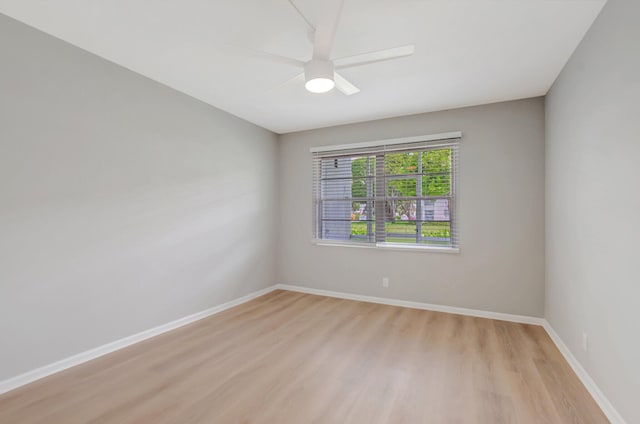 296 Fanshaw H, Boca Raton, FL 33434 - unfurnished room featuring light wood-type flooring, baseboards, and ceiling fan